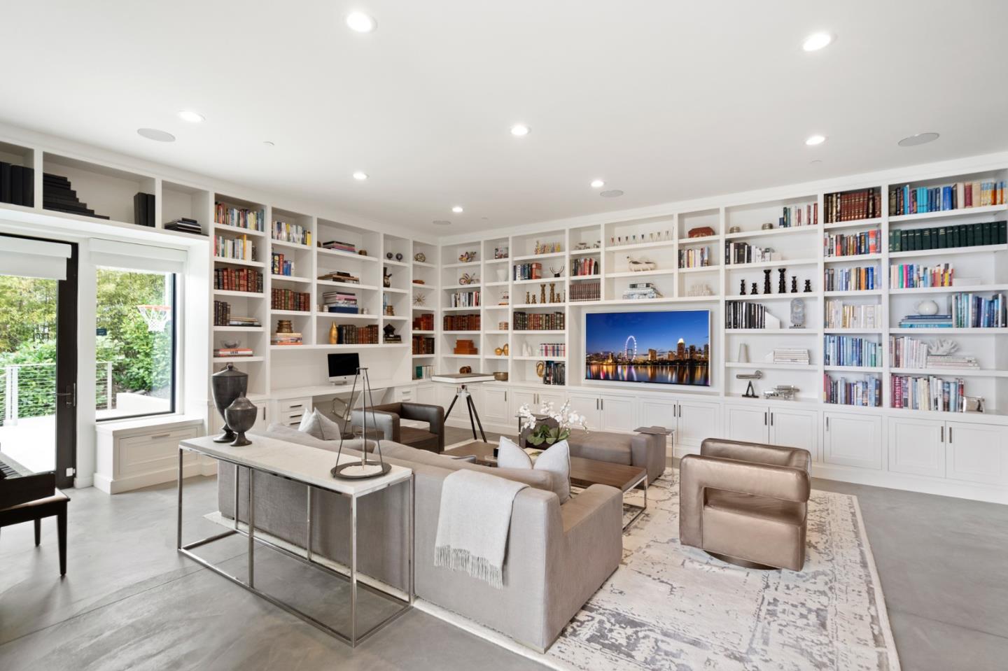 21 Gilmartin Drive Tiburon, CA 94920 - Photo 21 of 82 a living room with furniture and a flat screen tv