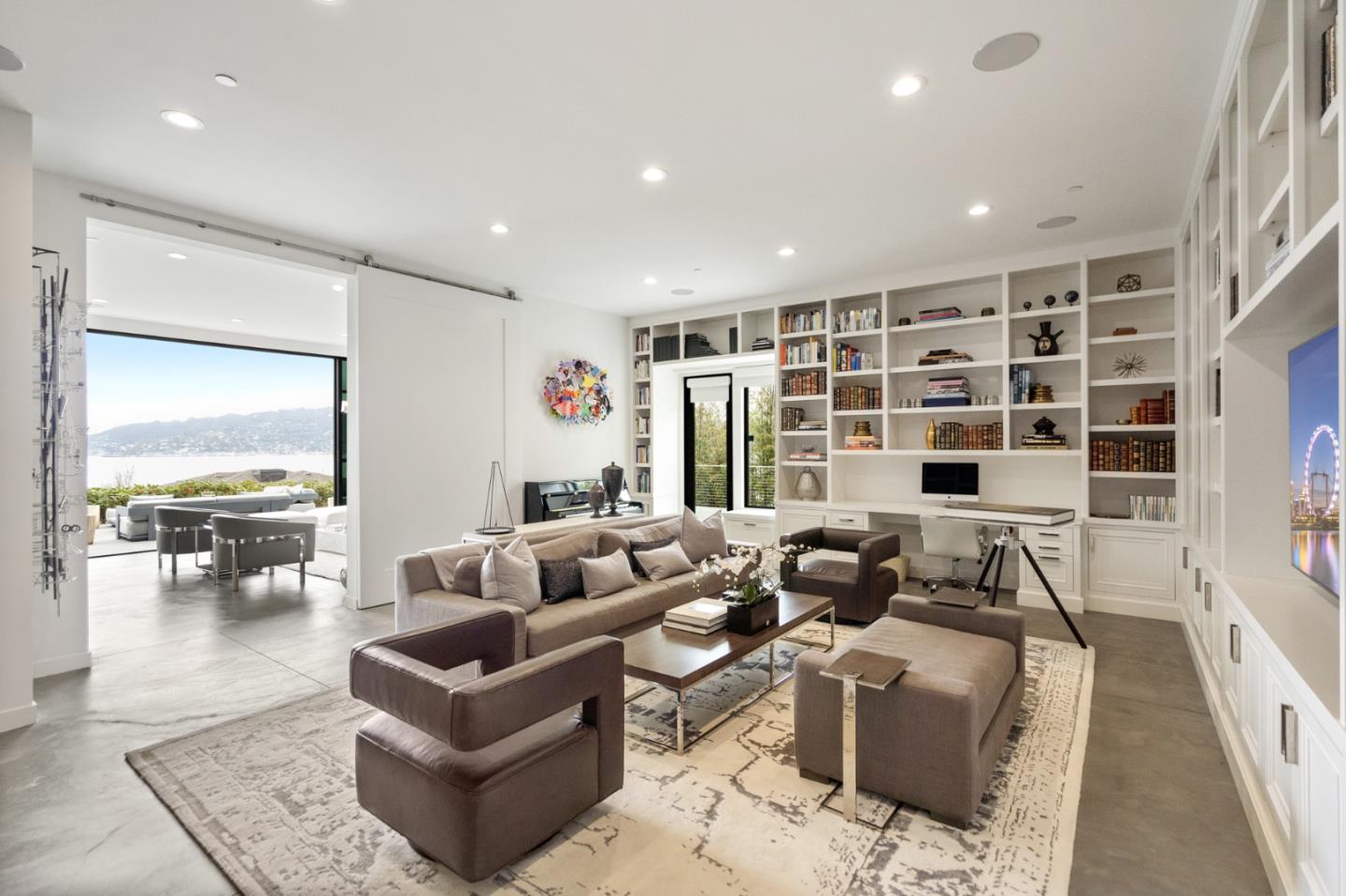 21 Gilmartin Drive Tiburon, CA 94920 - Photo 22 of 82 a living room with furniture and a large window