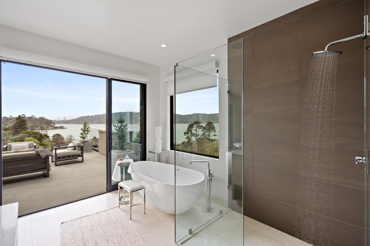 21 Gilmartin Drive Tiburon, CA 94920 - Photo 30 of 82 a living room with furniture and a floor to ceiling window