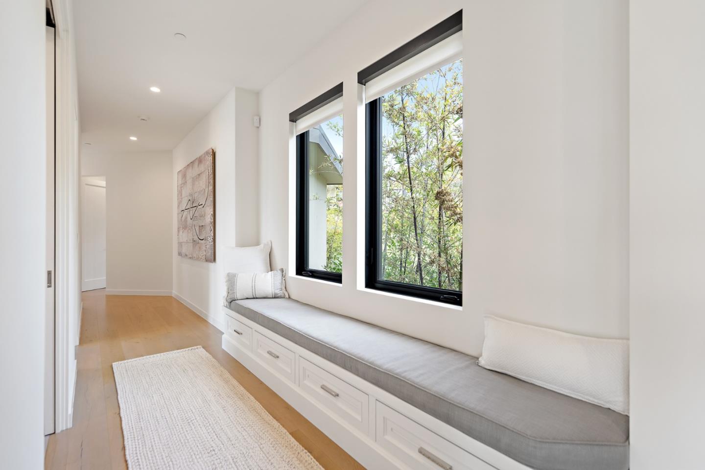 21 Gilmartin Drive Tiburon, CA 94920 - Photo 37 of 82 a view of a bedroom with wooden floor and a window
