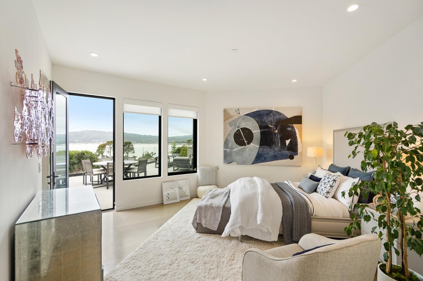 21 Gilmartin Drive Tiburon, CA 94920 - Photo 40 of 82 a bedroom with a bed and glass walk in closet