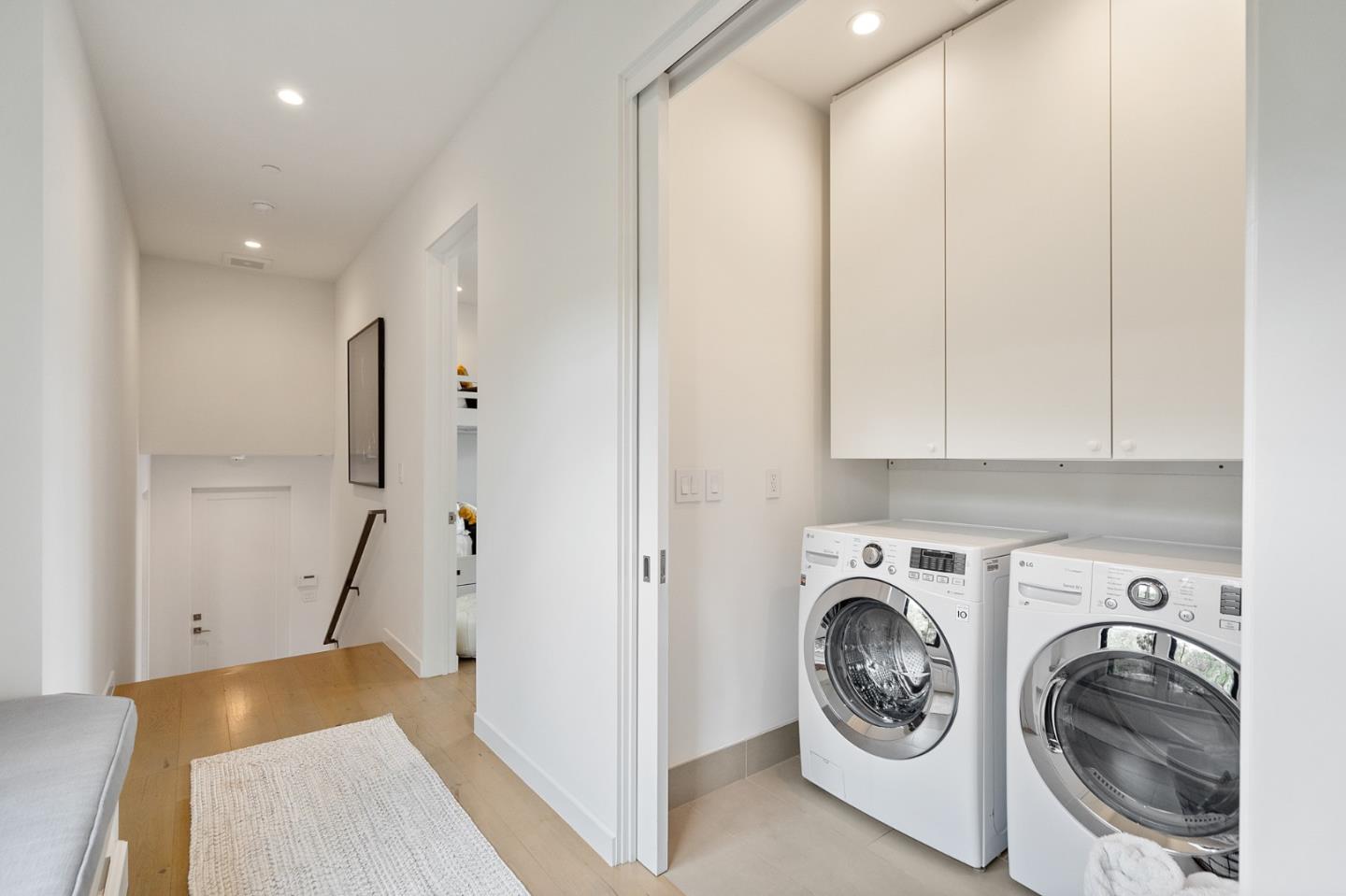 21 Gilmartin Drive Tiburon, CA 94920 - Photo 45 of 82 a view of a storage & utility room with washer and dryer