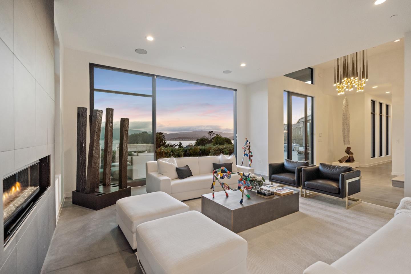 21 Gilmartin Drive Tiburon, CA 94920 - Photo 62 of 82 a living room with furniture and a fireplace