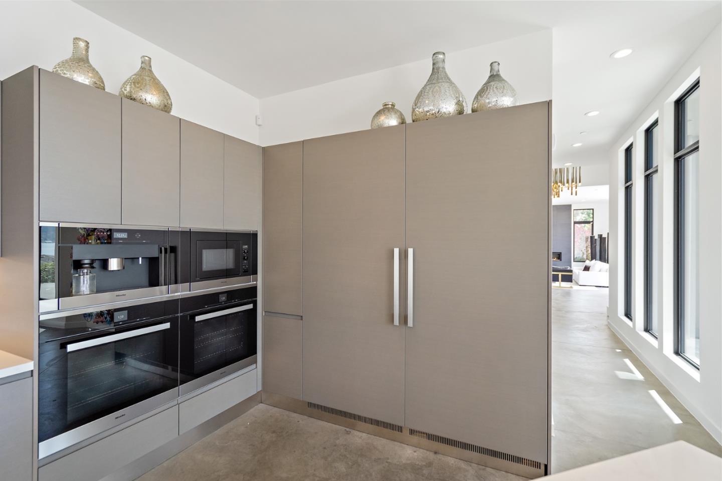 21 Gilmartin Drive Tiburon, CA 94920 - Photo 68 of 82 a view of a kitchen with refrigerator and an oven