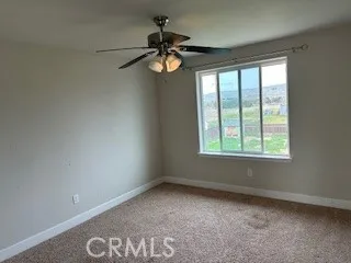 a view of empty room with windows
