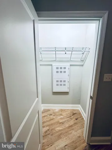 a view of a room with racks on the wall