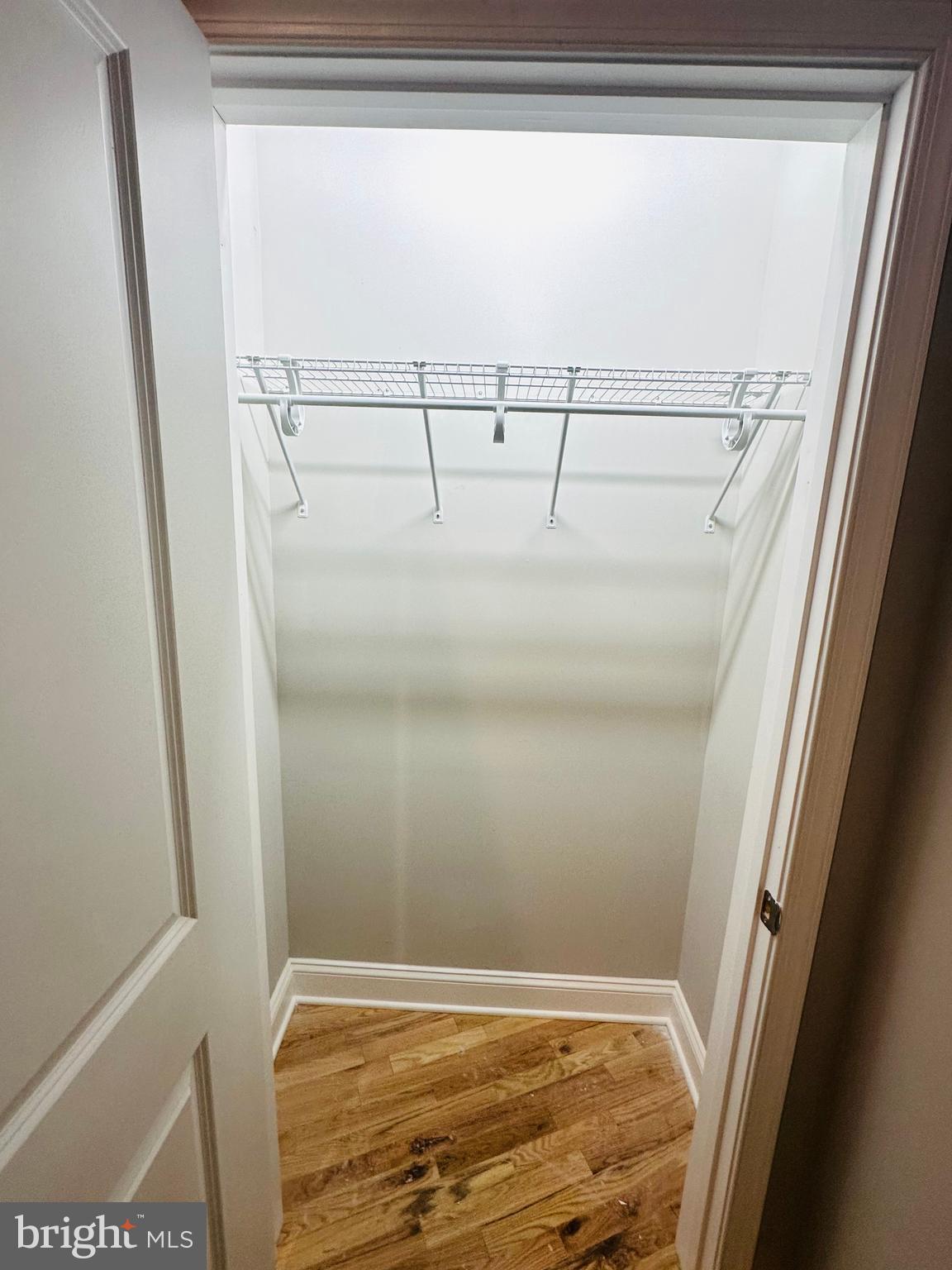 100 West Lexington Street, Unit 301 Baltimore, MD 21201 - Photo 23 of 30 a view of walk in closet with empty racks