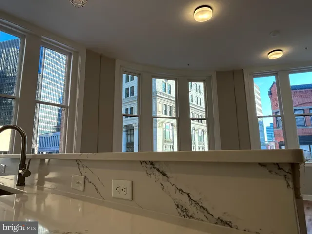 a view of a living room and entry way