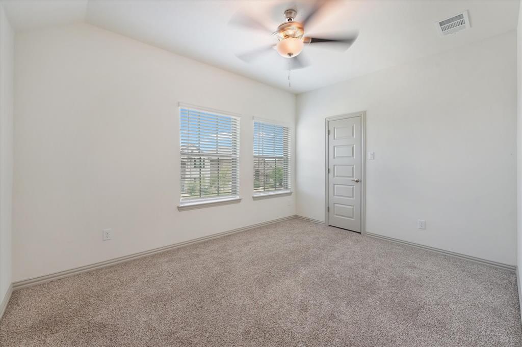 3208 Heathrow Road Mesquite, TX 75181 - Photo 14 of 21 a view of an empty room with a window