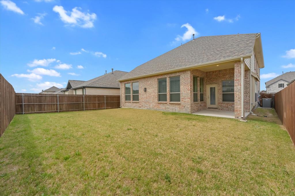 3208 Heathrow Road Mesquite, TX 75181 - Photo 19 of 21 a view of a house with backyard and porch