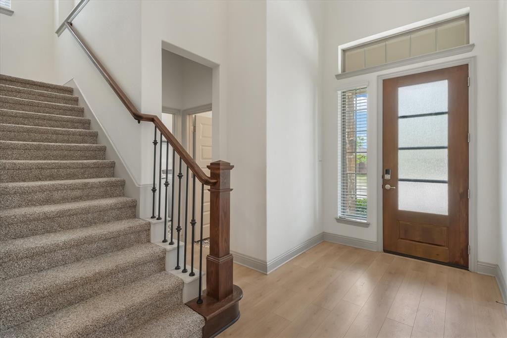 3208 Heathrow Road Mesquite, TX 75181 - Photo 2 of 21 a view of an entryway with staircase