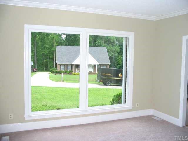 2008 Hilly Ridge Raleigh, NC 27603 - Photo 3 of 10 a view of an empty room with a window and yard