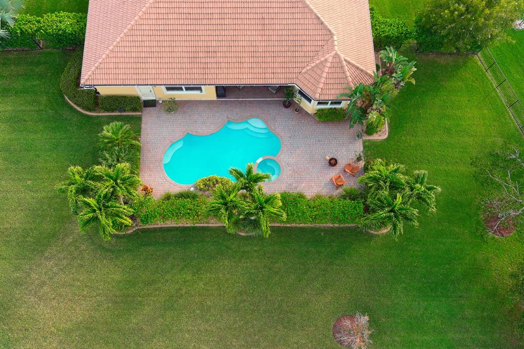 7619 Southeast Belle Maison Drive Stuart, FL 34997 - Photo 32 of 44 an aerial view of a house