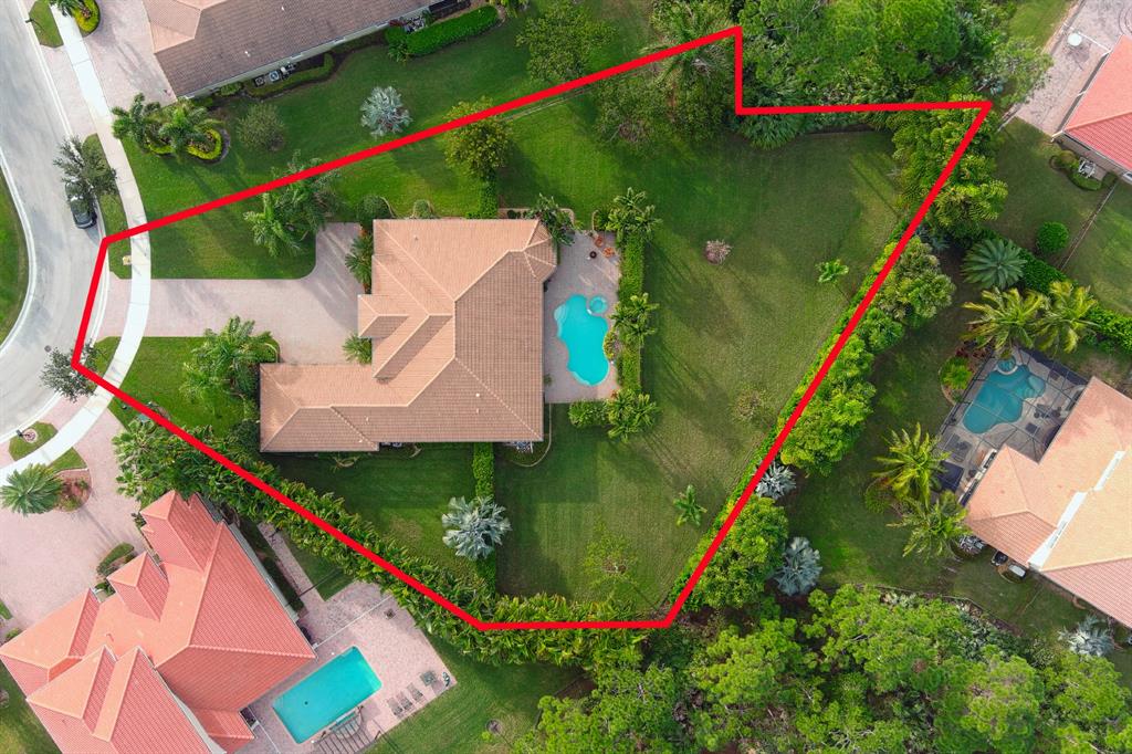 7619 Southeast Belle Maison Drive Stuart, FL 34997 - Photo 39 of 44 an aerial view of a house