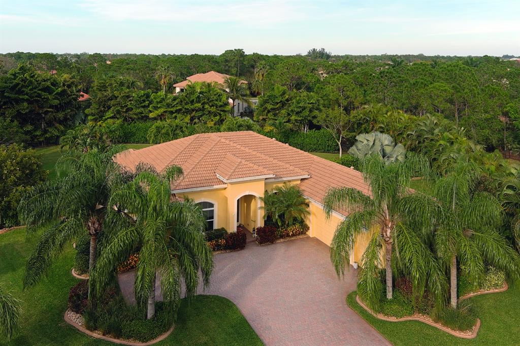 7619 Southeast Belle Maison Drive Stuart, FL 34997 - Photo 42 of 44 an aerial view of a house