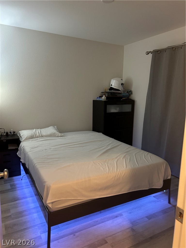 10638 Adobe Rnch Street Las Vegas, NV 89141 - Photo 34 of 35 Bedroom with wood finished floors