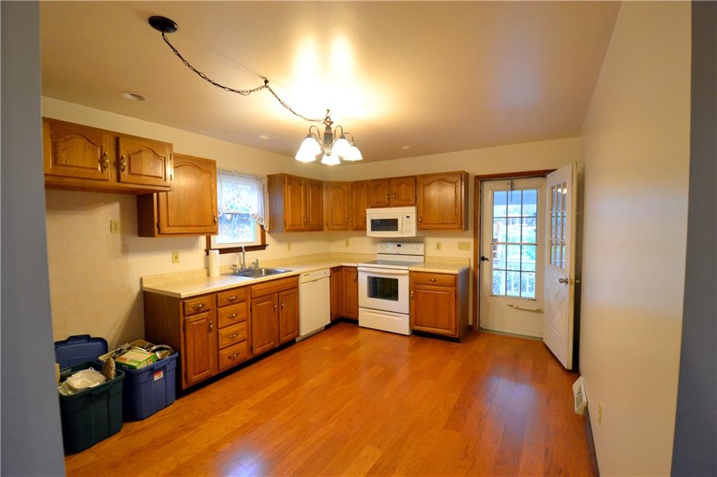 287 Glen Eden Road Rochester, PA 15074 - Photo 5 of 12 Neutral Kitchen with new floor and access to covered porch