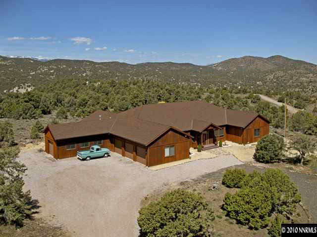 4000 Palisade Road Reno, NV 89521 - Photo 1 of 1 an aerial view of a house with a yard