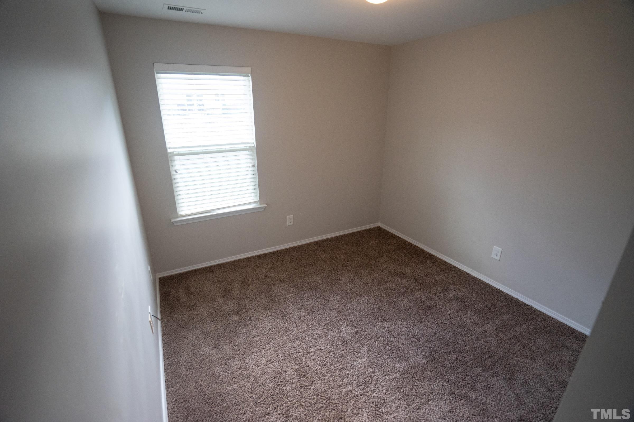 3 Mint Hill Court Durham, NC 27703 - Photo 16 of 19 an empty room with a window