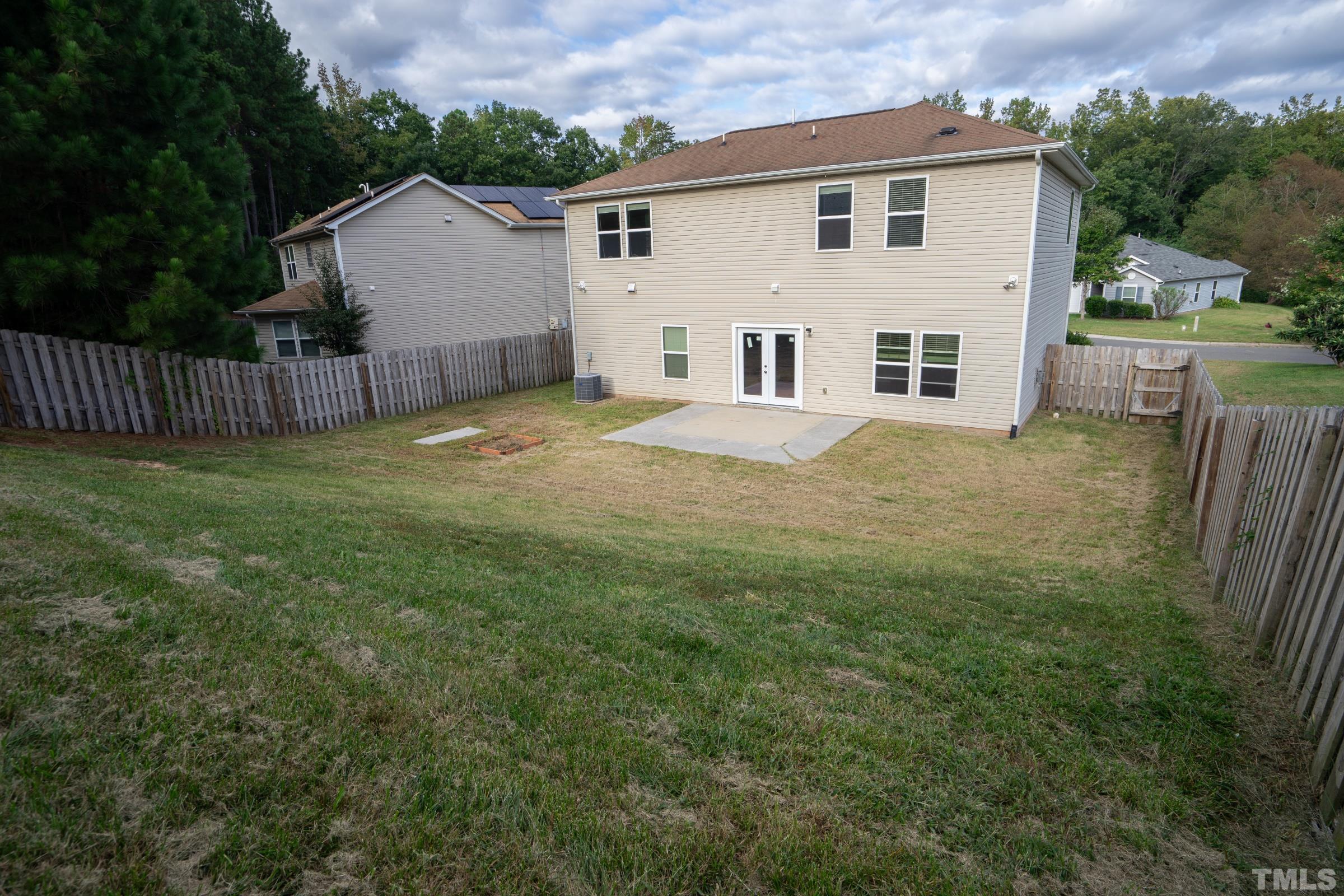 3 Mint Hill Court Durham, NC 27703 - Photo 19 of 19 a view of a house with backyard