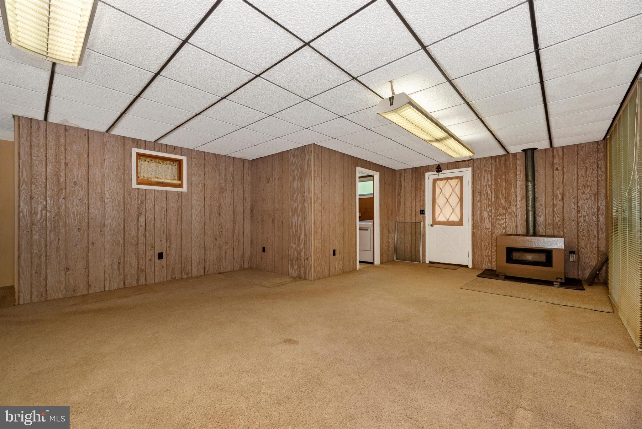 7810 Roddy Creek Road Thurmont, MD 21788 - Photo 17 of 53 Family Room with Half Bath and Laundry Room