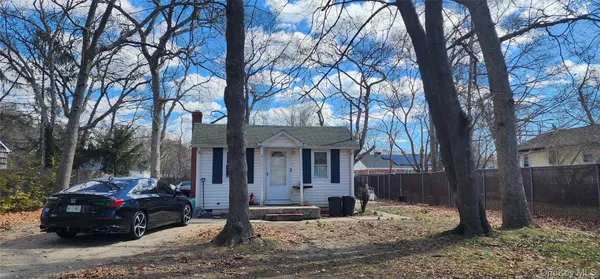 a car parked in front of a house