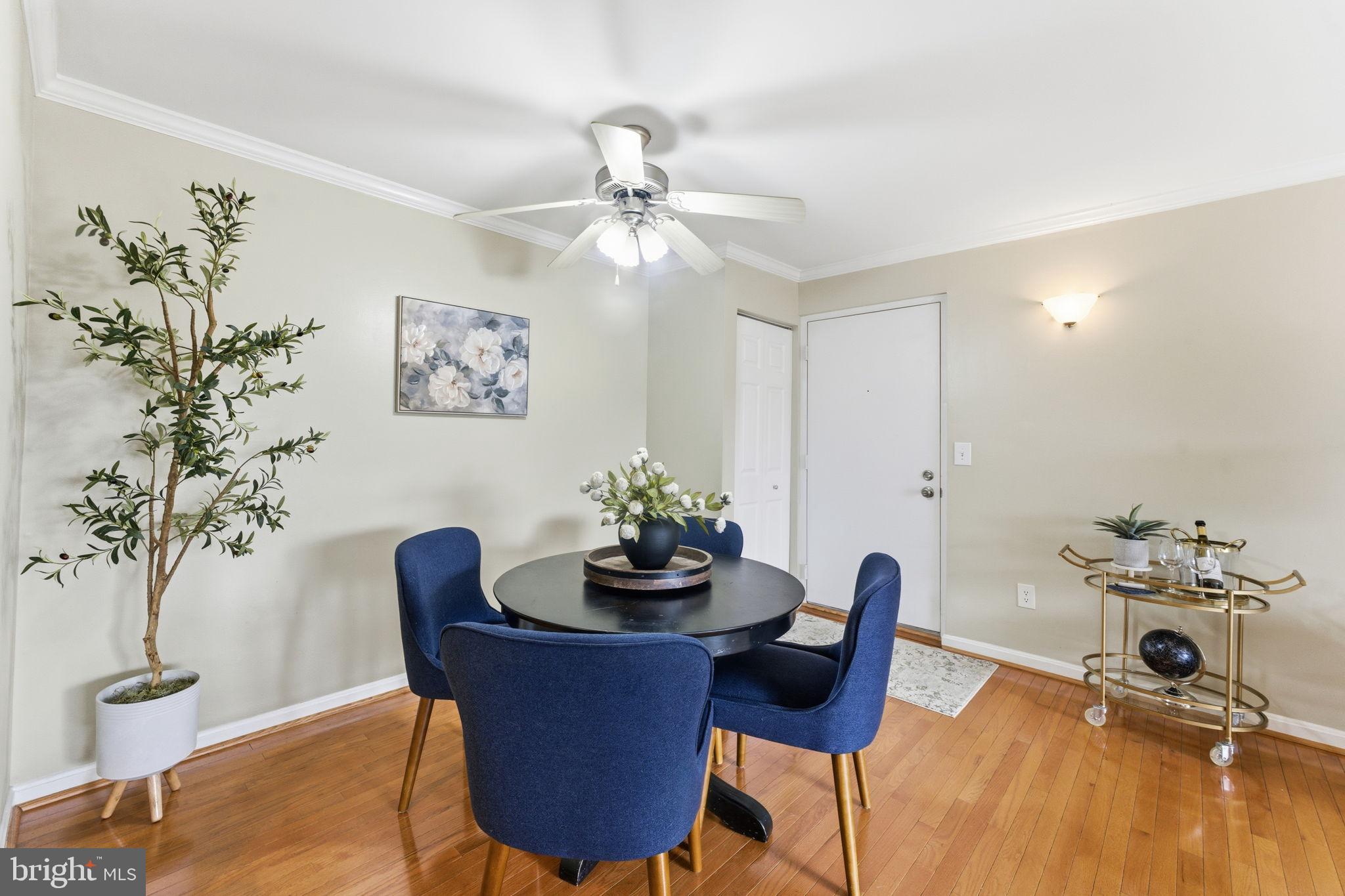 14901 Rydell Road, Unit 303 Centreville, VA 20121 - Photo 12 of 45 Charming dining area with modern flair.