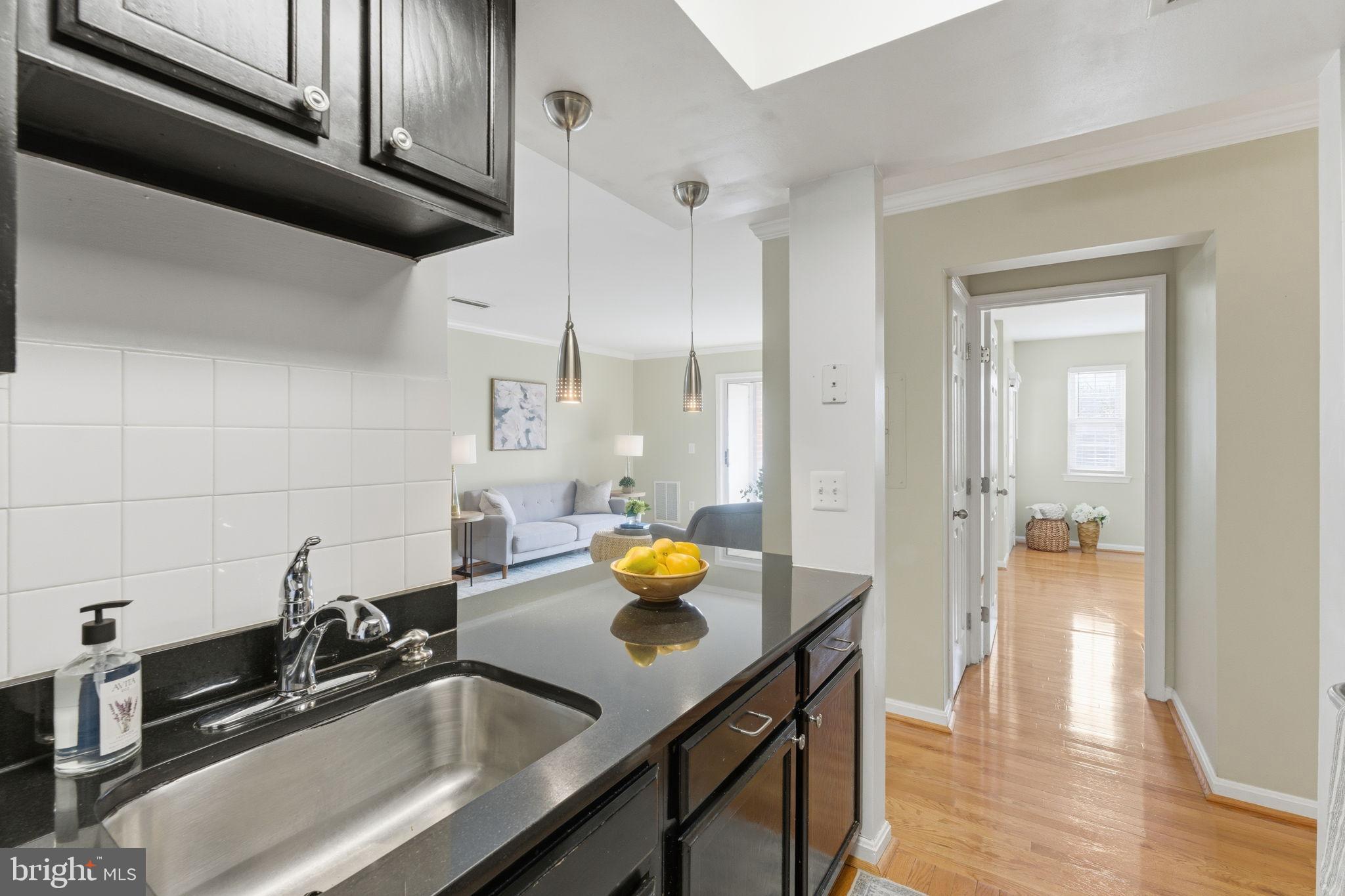 14901 Rydell Road, Unit 303 Centreville, VA 20121 - Photo 18 of 45 Modern kitchen with sleek finishes.