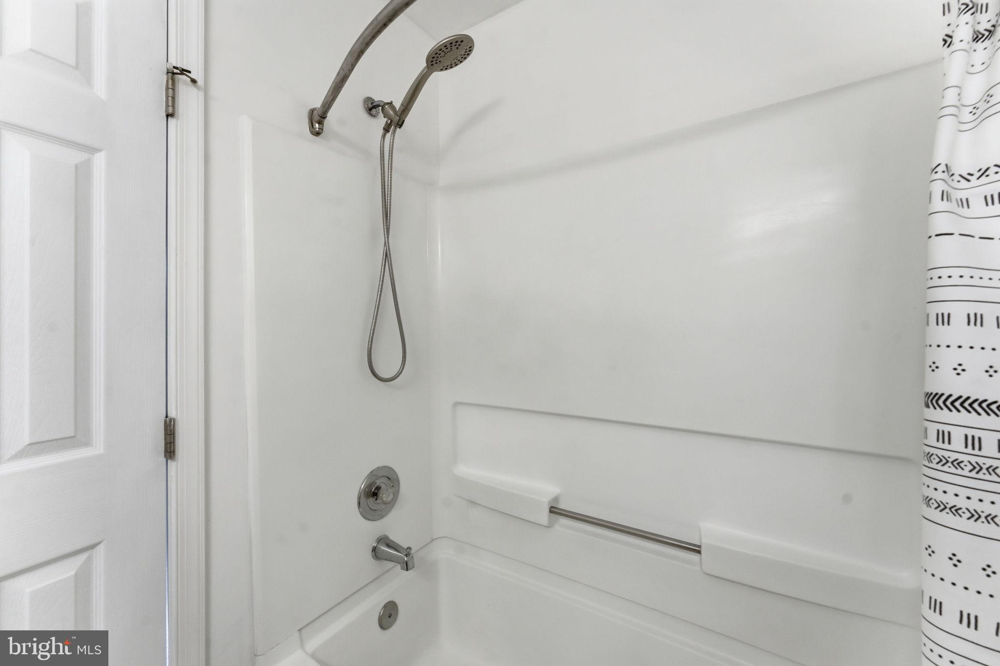 14901 Rydell Road, Unit 303 Centreville, VA 20121 - Photo 30 of 45 Modern shower space with sleek design.