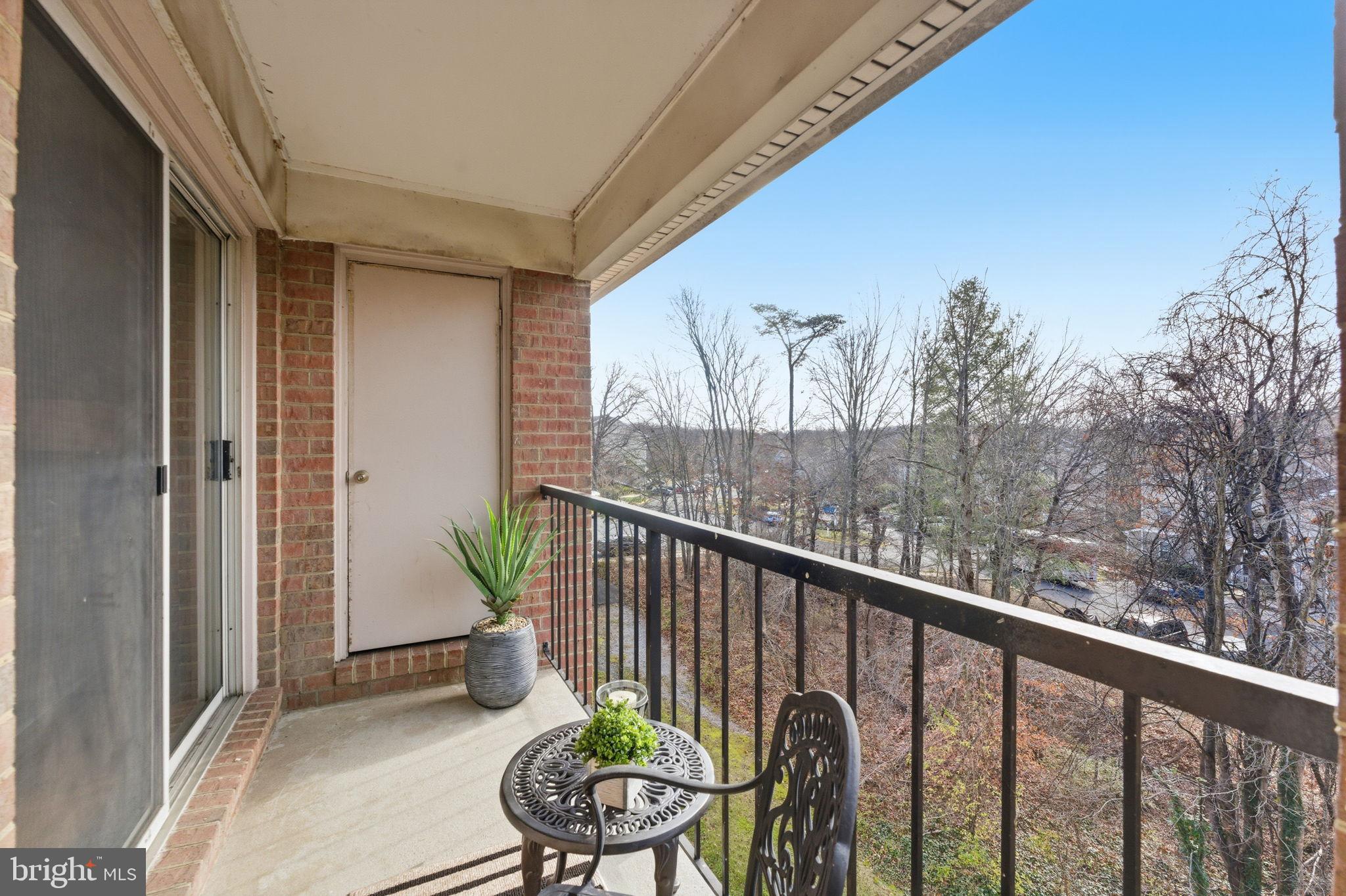 14901 Rydell Road, Unit 303 Centreville, VA 20121 - Photo 32 of 45 Charming balcony with serene views.