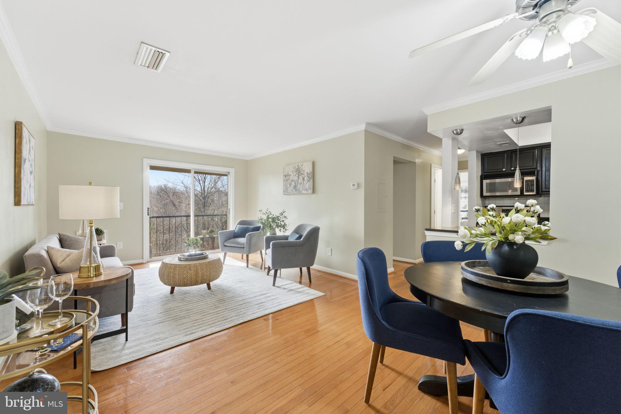 14901 Rydell Road, Unit 303 Centreville, VA 20121 - Photo 10 of 45 Bright and airy living space with scenic views.