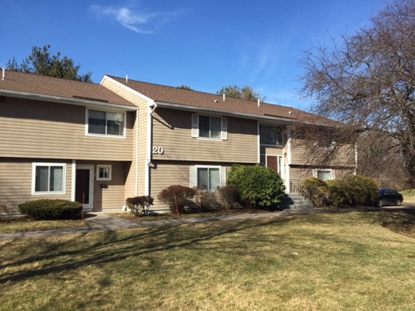 20 F Beal's Cove Road, Unit F Hingham, MA 02043 - Photo 1 of 3 a front view of a house with a yard