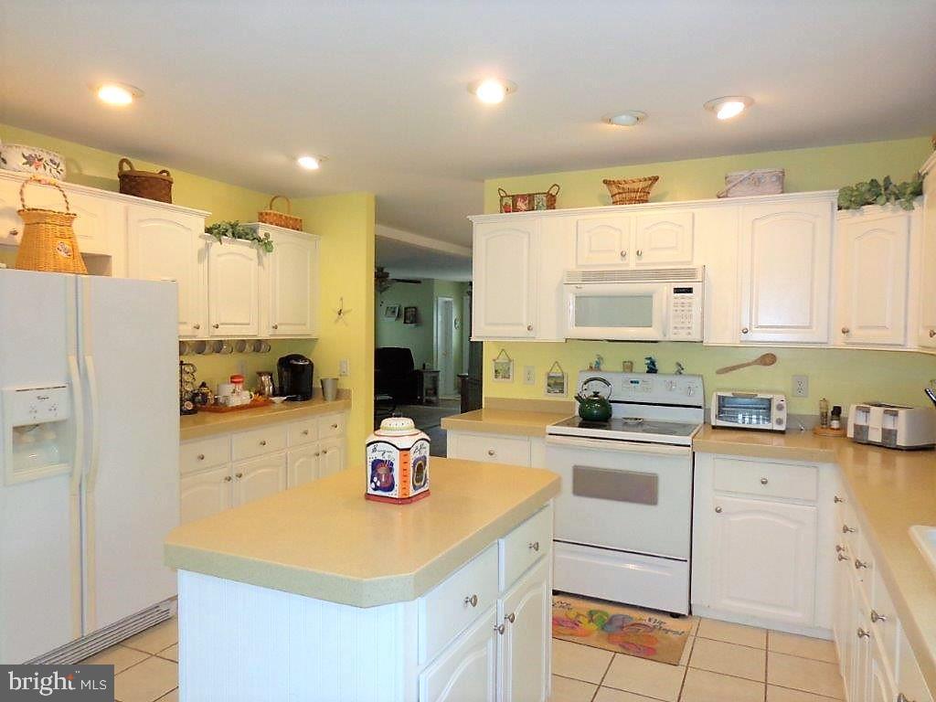 32530 Approach Way, Unit 3252 Millsboro, DE 19966 - Photo 28 of 109 Upgraded corian counters with wide base