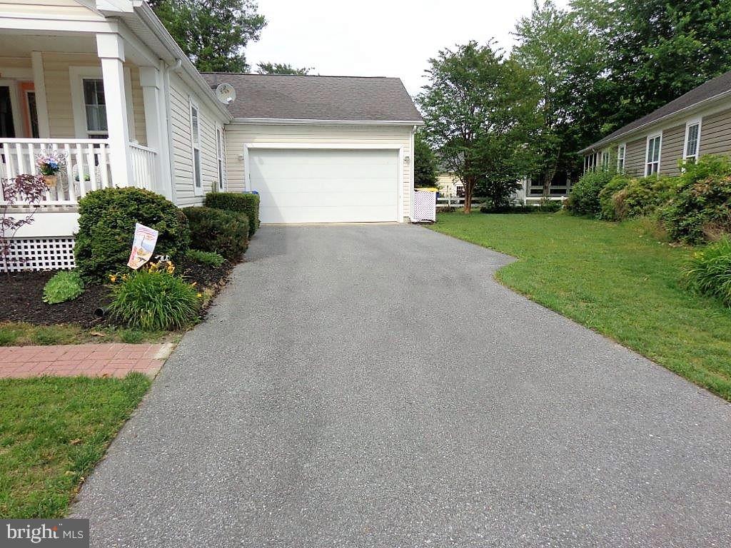 32530 Approach Way, Unit 3252 Millsboro, DE 19966 - Photo 47 of 109 Long black top driveway for plenty of parking