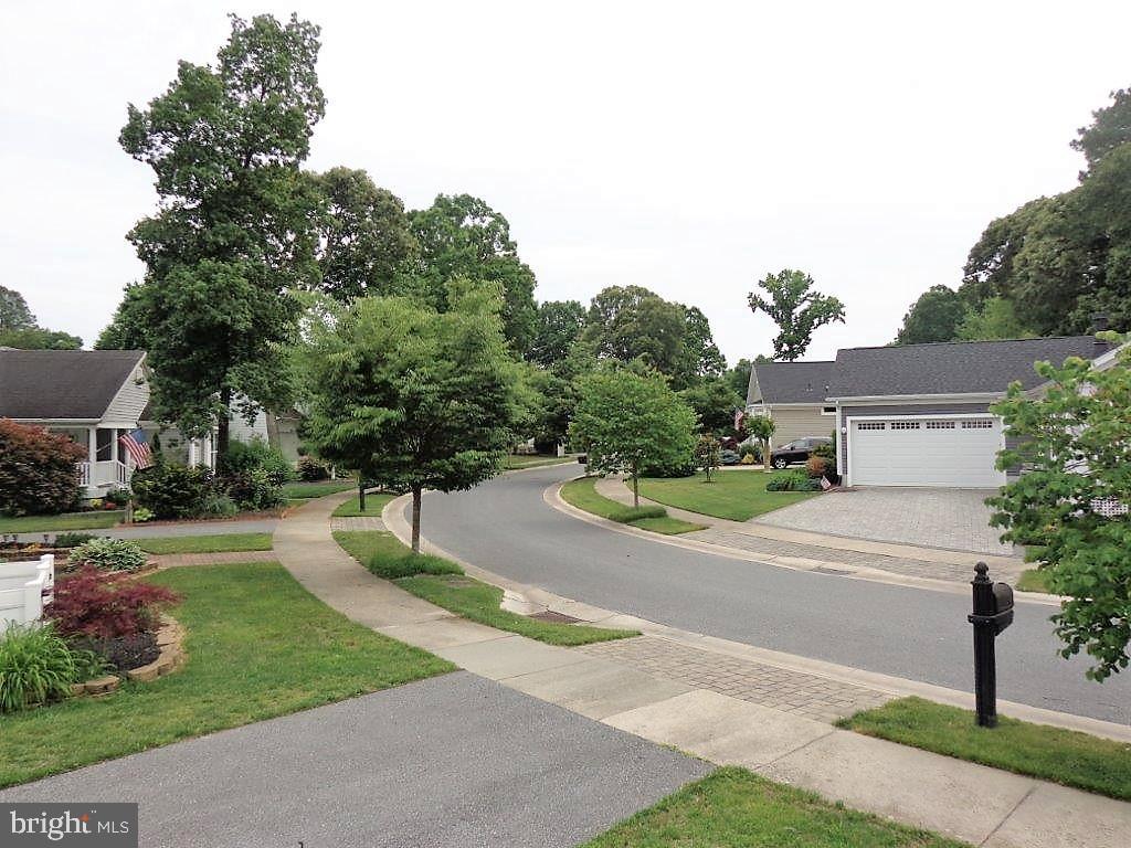 32530 Approach Way, Unit 3252 Millsboro, DE 19966 - Photo 6 of 109 View of quiet tree line street from porch