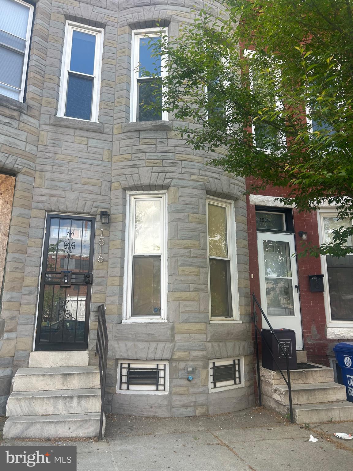 1516 North Mount Street Baltimore, MD 21217 - Photo 2 of 30 a front view of a house