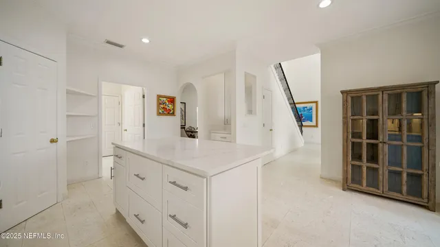 a view of a workspace with furniture