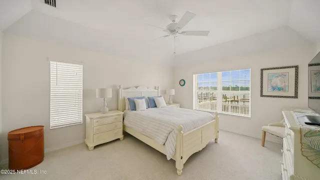 a large bathroom with a double vanity sink a large mirror and shower