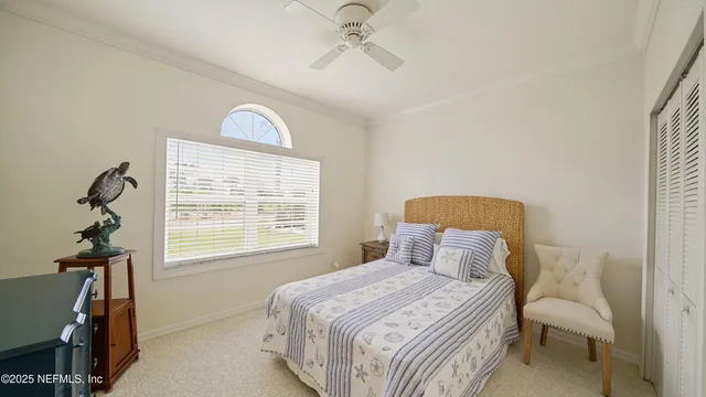 a view of a hallway with windows