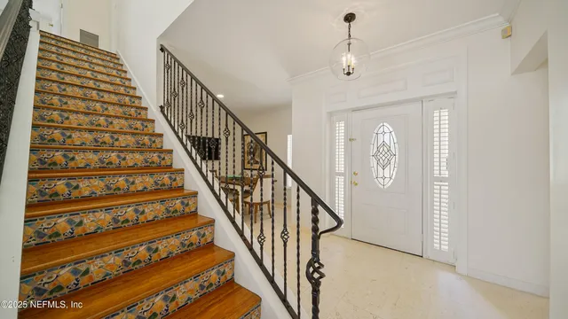 a bathroom with a granite countertop sink mirror and shower