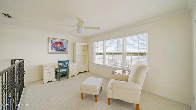 a bathroom with a shower and a glass door