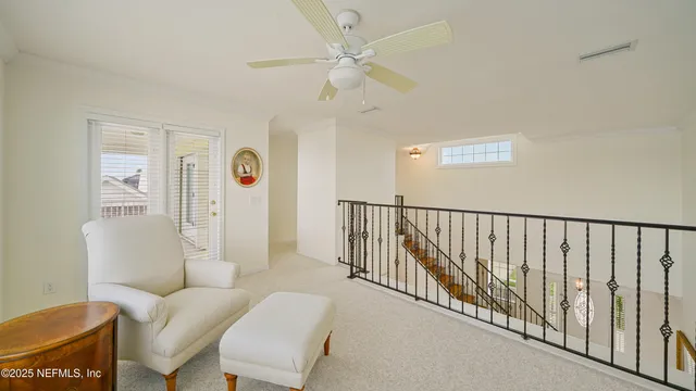 a view of a large room with a large window