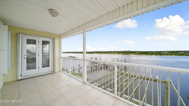 a view of a balcony with an ocean view