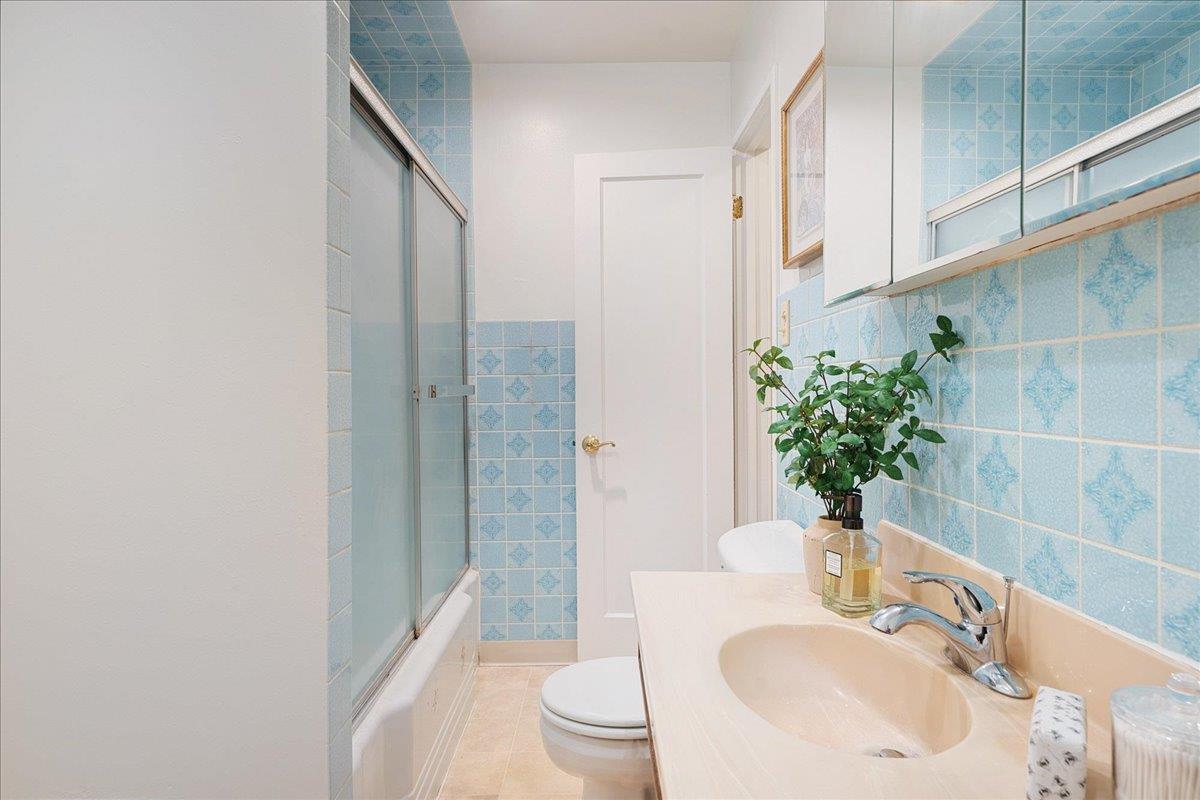 2908 Sandy Lane Santa Cruz, CA 95062 - Photo 14 of 28 a bathroom with a sink toilet and shower
