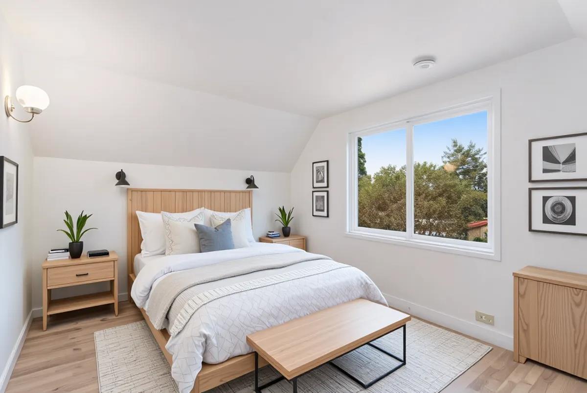 2908 Sandy Lane Santa Cruz, CA 95062 - Photo 15 of 28 a bedroom with a bed a window and a couch