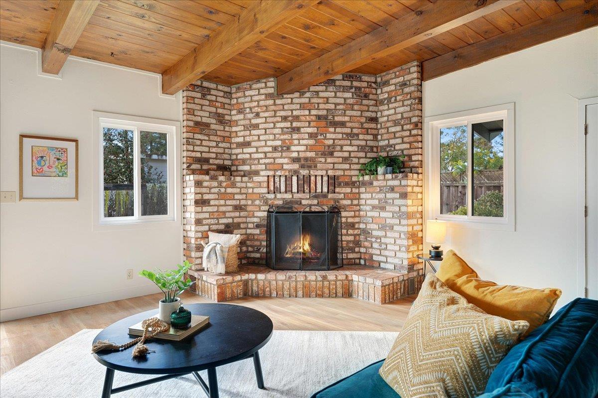 2908 Sandy Lane Santa Cruz, CA 95062 - Photo 9 of 28 a living room with furniture and a fireplace