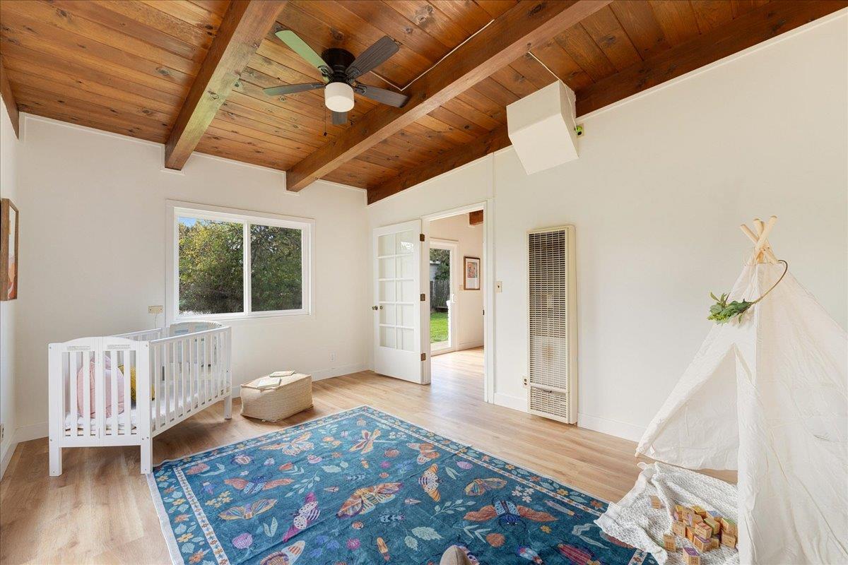 2908 Sandy Lane Santa Cruz, CA 95062 - Photo 10 of 28 a view of a livingroom with wooden floor and a rug