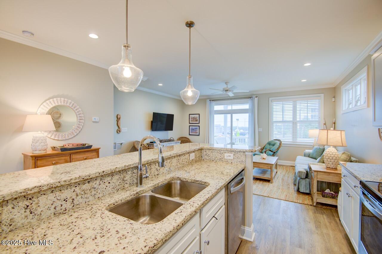 2800 West Fort Macon Road, Unit 13 SEASIDE VILLAS Atlantic Beach, NC 28512 - Photo 13 of 56 Open kitchen, dining, and living room