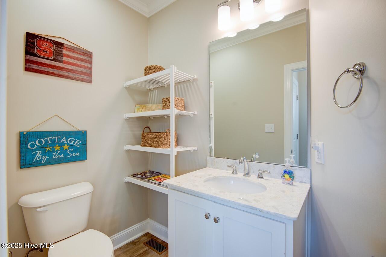 2800 West Fort Macon Road, Unit 13 SEASIDE VILLAS Atlantic Beach, NC 28512 - Photo 17 of 56 Downstairs Powder Room