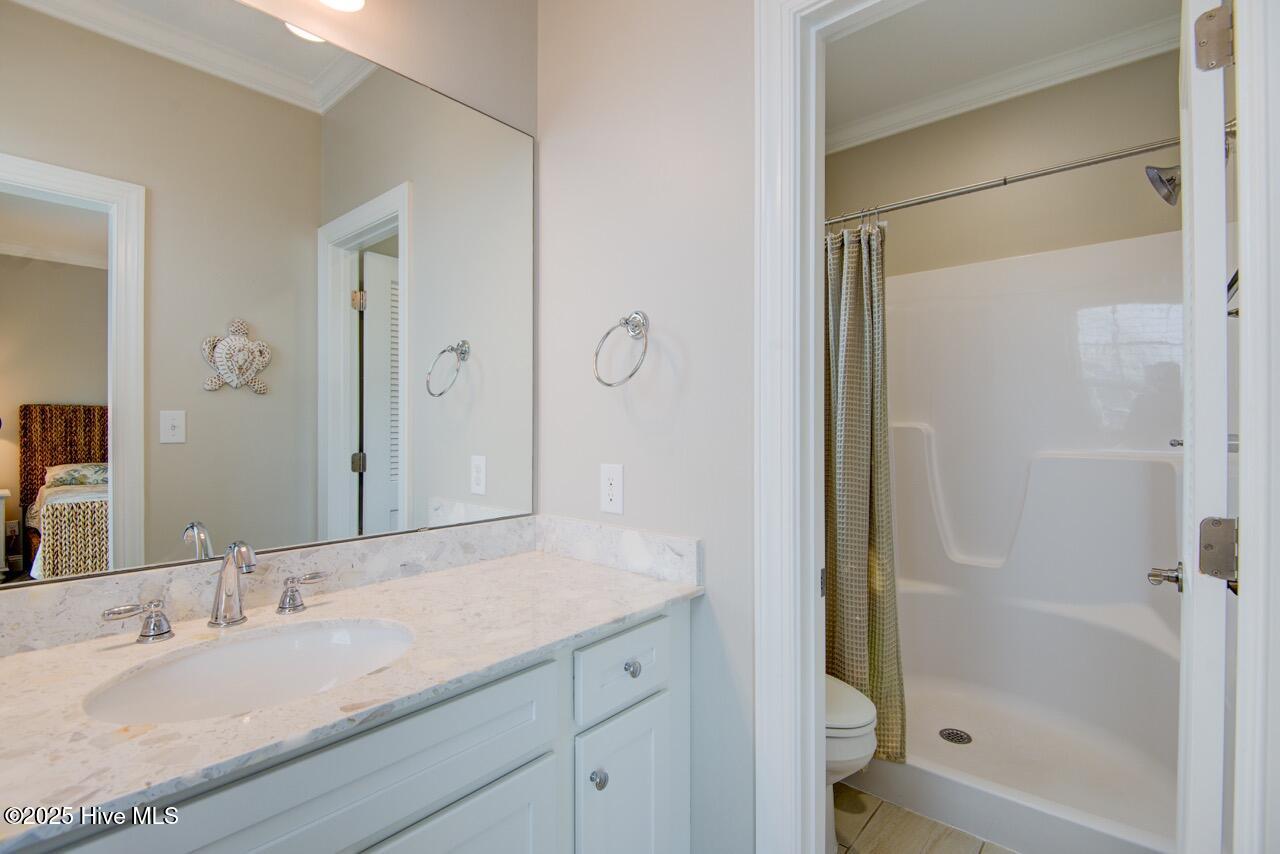 2800 West Fort Macon Road, Unit 13 SEASIDE VILLAS Atlantic Beach, NC 28512 - Photo 9 of 56 En-suite primary bathroom
